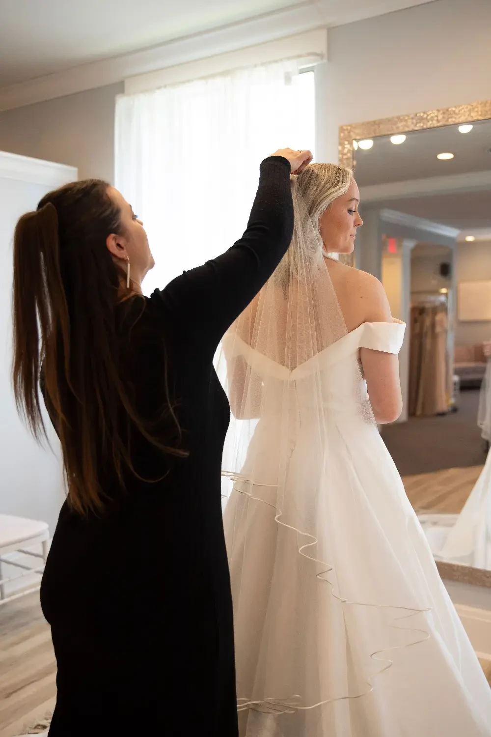 Photo of the model wearing a white bridal gown - Mobile Image