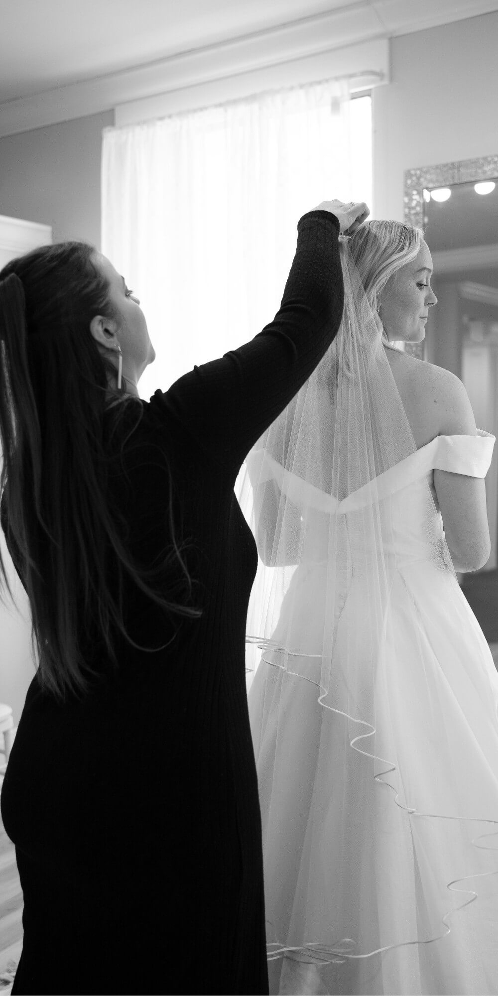 Photo of the model wearing a white bridal gown - Mobile Image